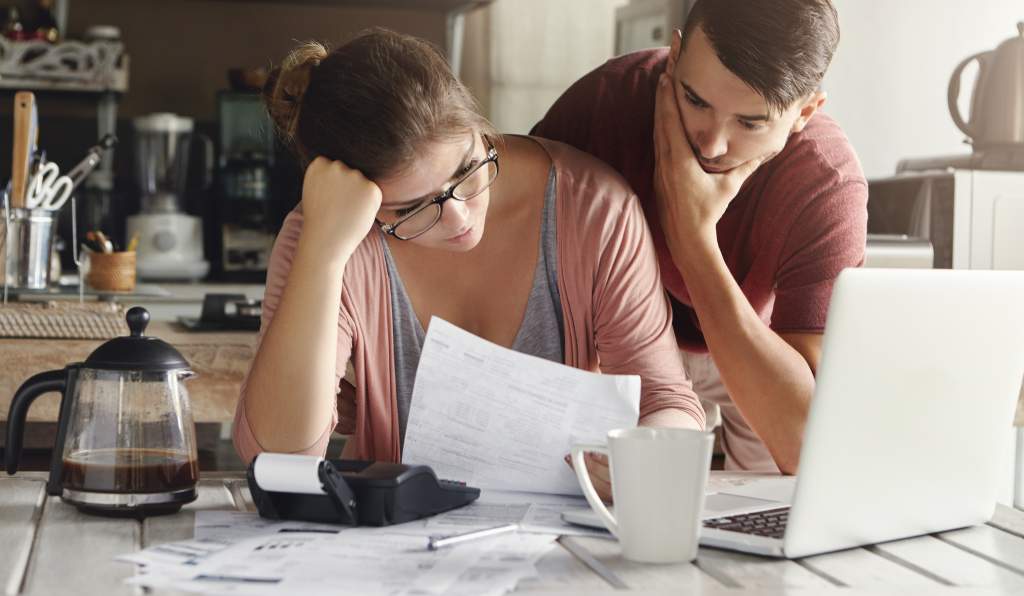 Couple looking at bills