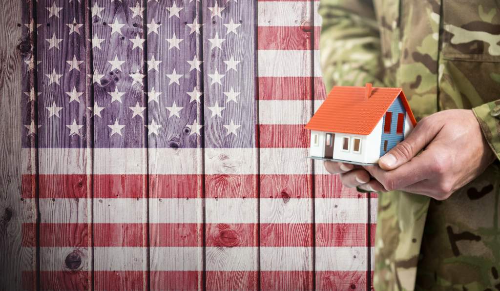 American flag and house