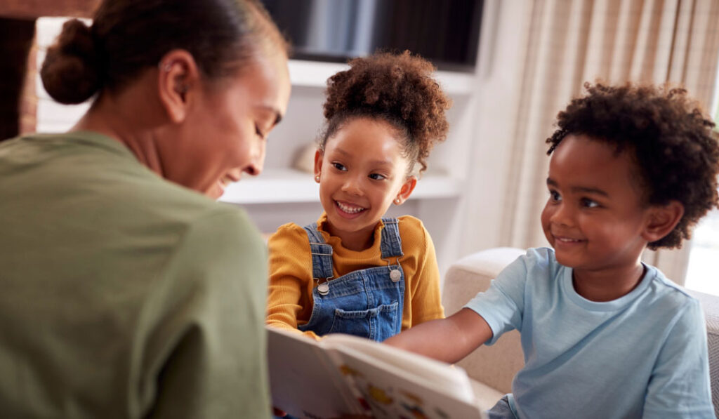 Mother reading to children