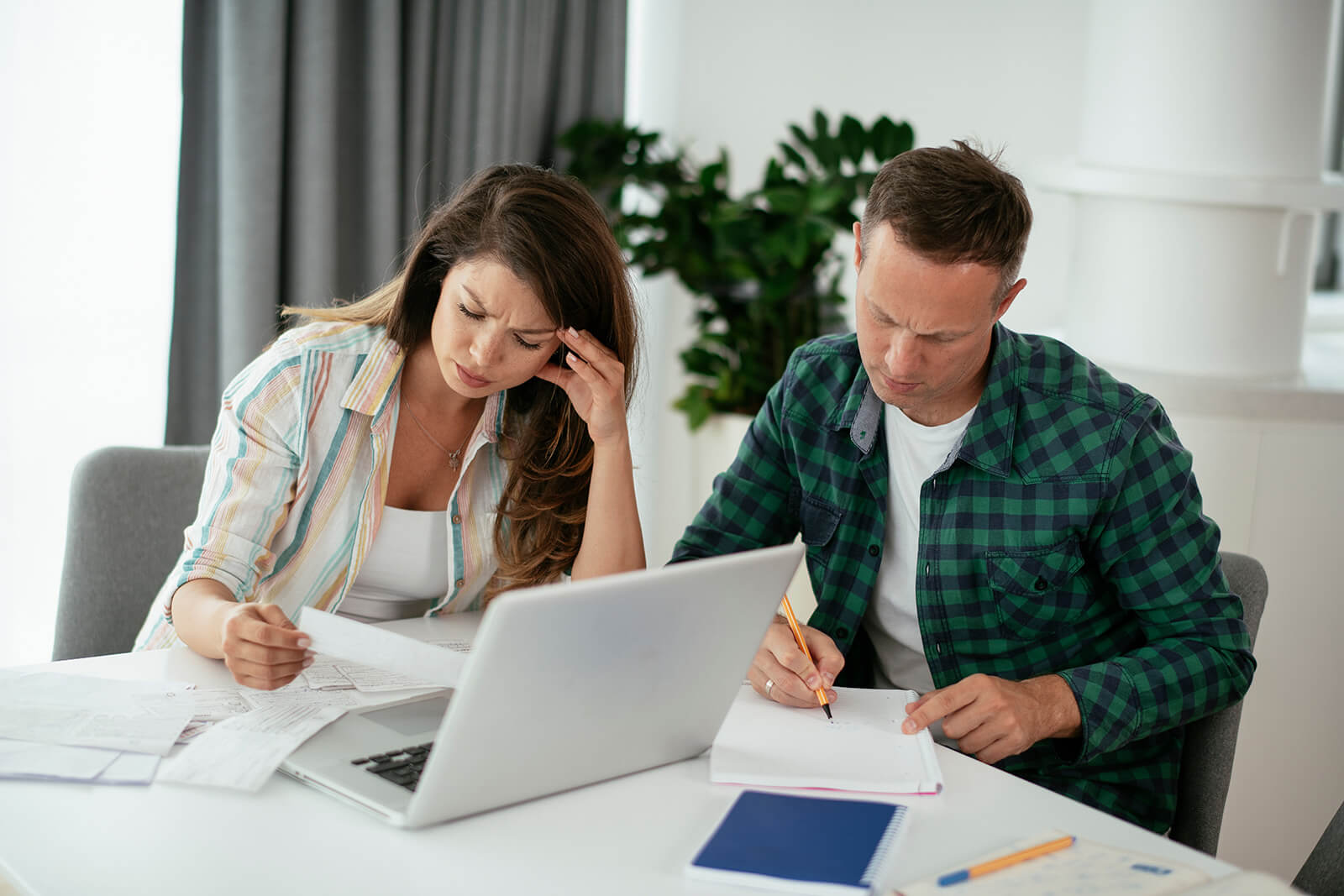 Couple preparing to pay bills