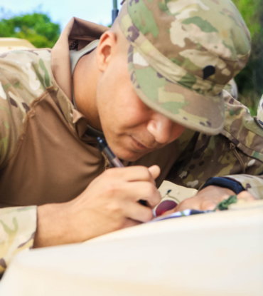 Servicemember filling out paperwork