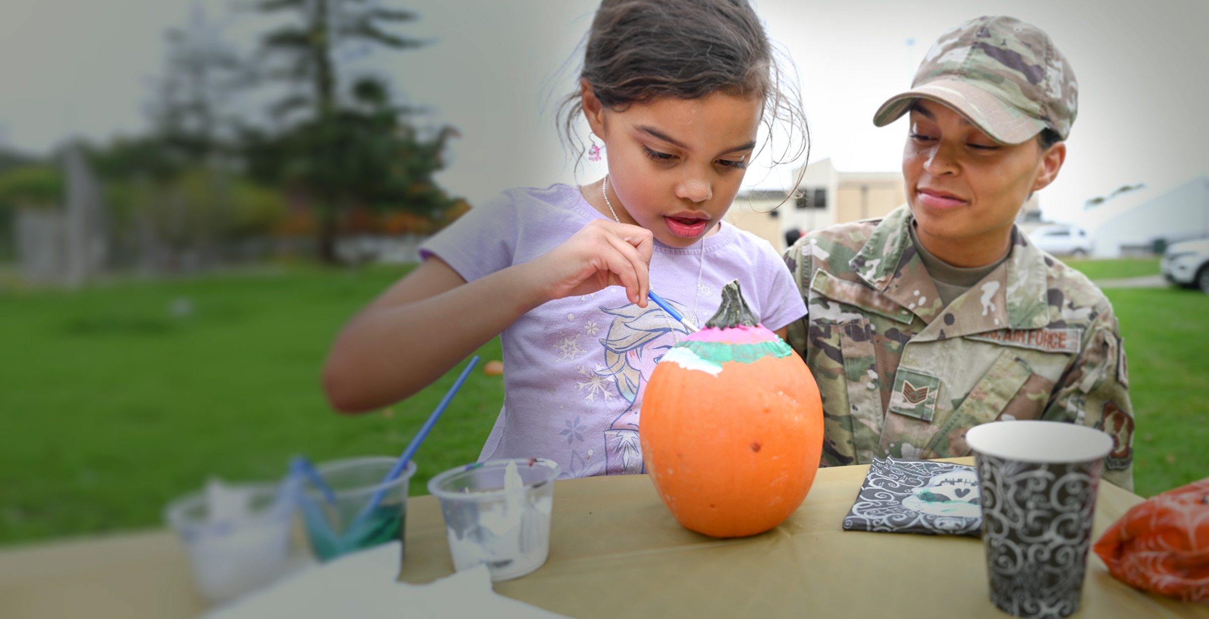 Military Family Carving Pumpkins