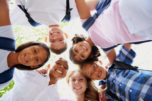 Children huddling together for photo